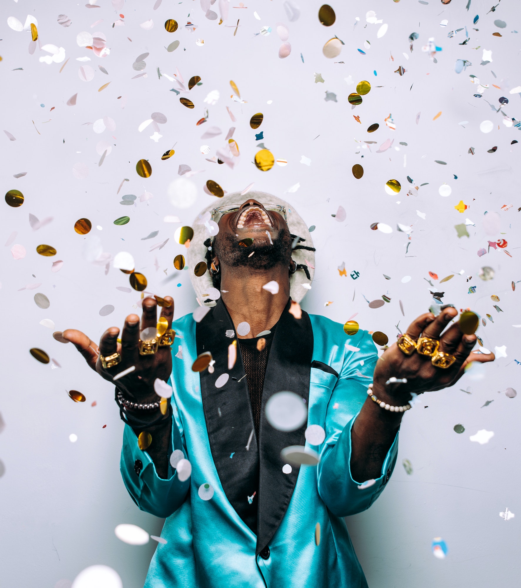 portrait of an hip hop music performer with confetti drop