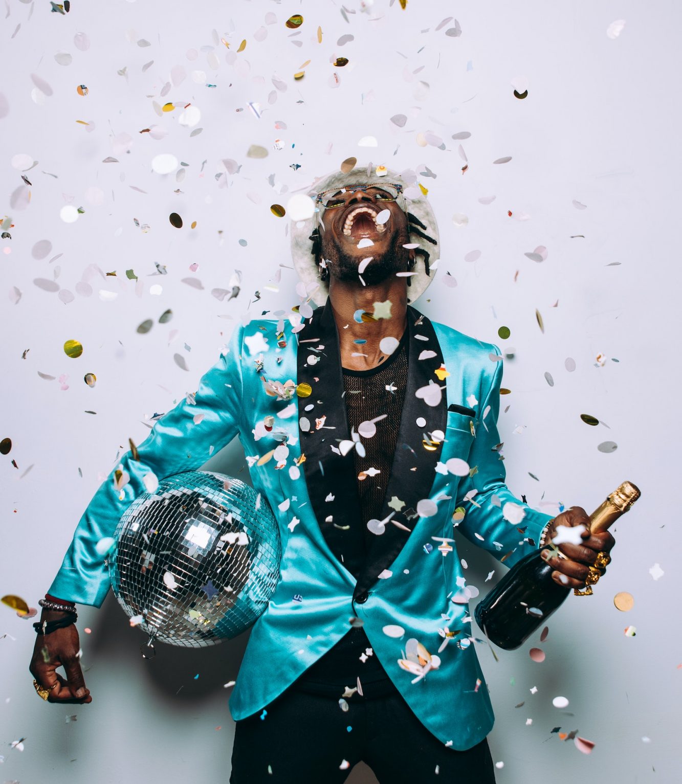 Portrait of an hip hop music performer with confetti drop